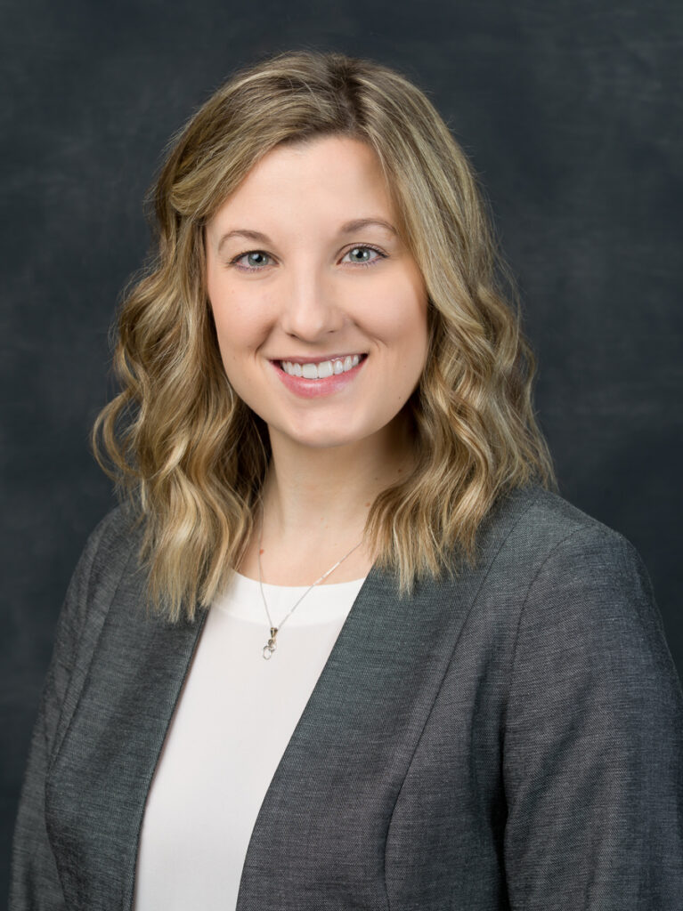 Studio portrait of a real client from a recent session Portrait of a professional client photographed in the studio with natural expression and clean lighting